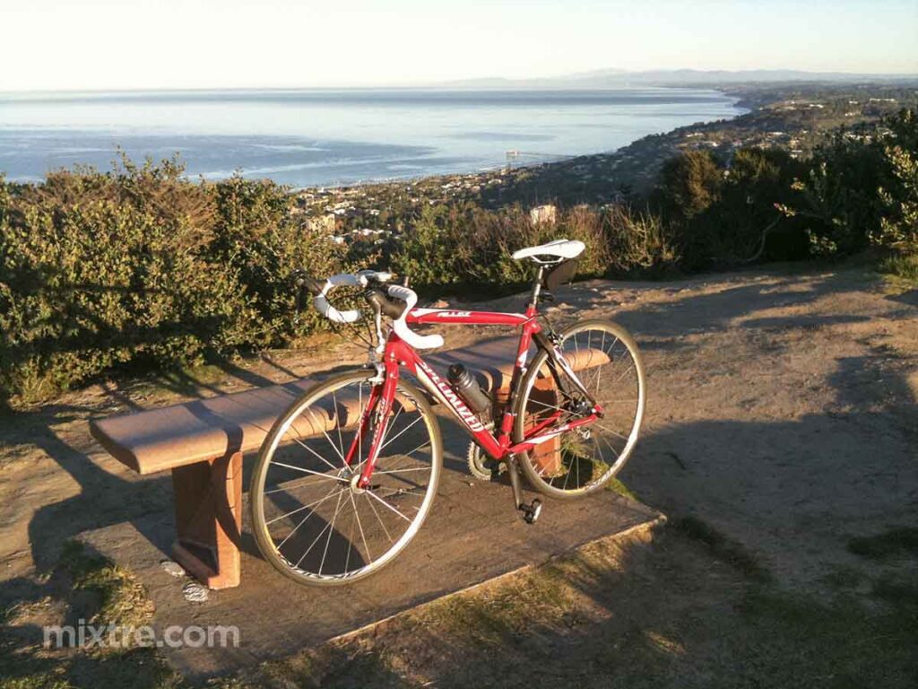 Allez at the top of Mt Soledad with the ocean in the background