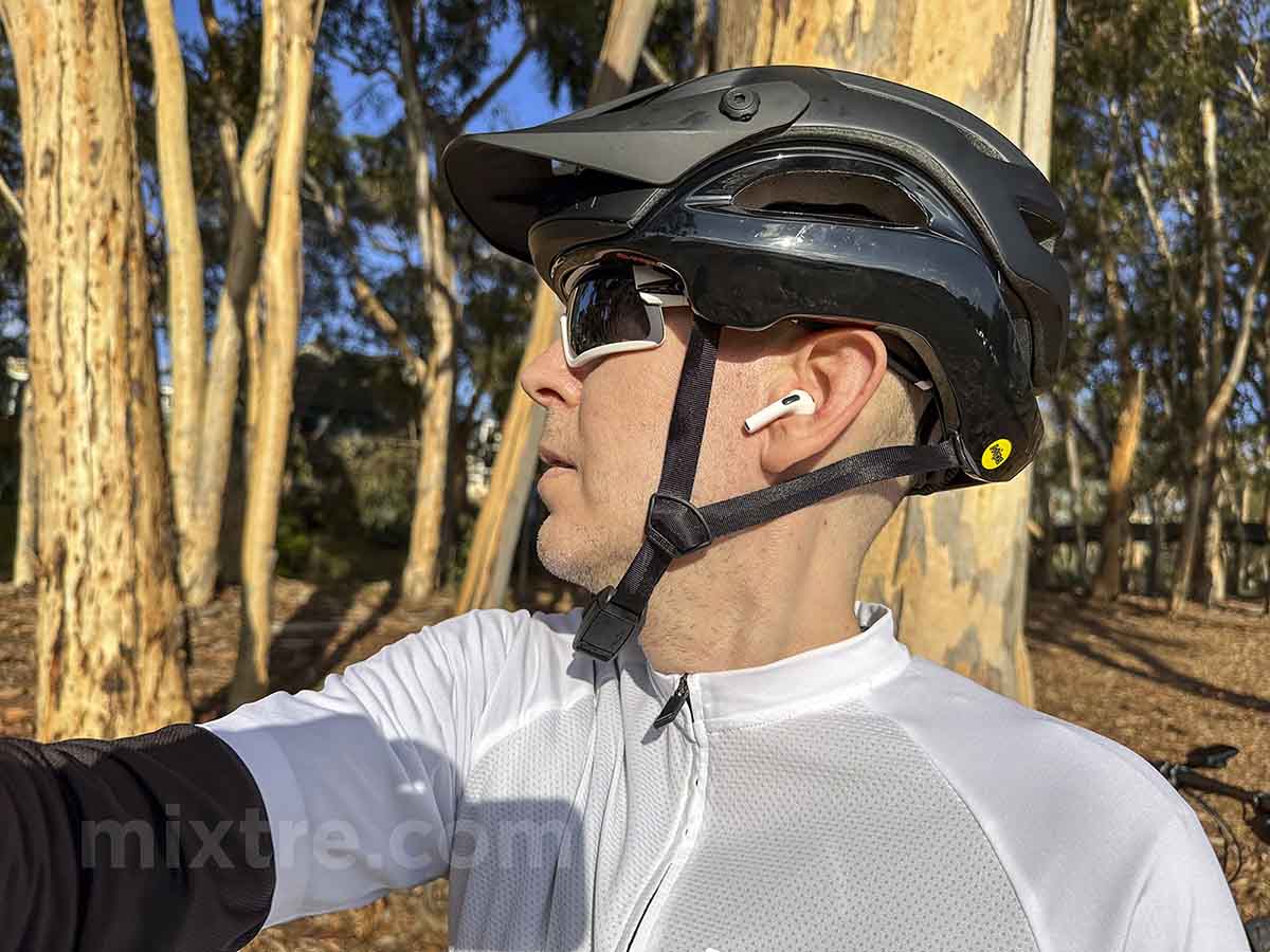 Wearing AirPods Pro with a cycling helmet and jersey